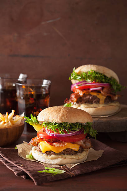 istock bacon cheese burger with beef patty tomato onion 628748416
