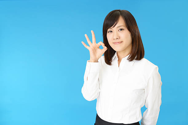 istock Business woman with ok hand sign 628761148