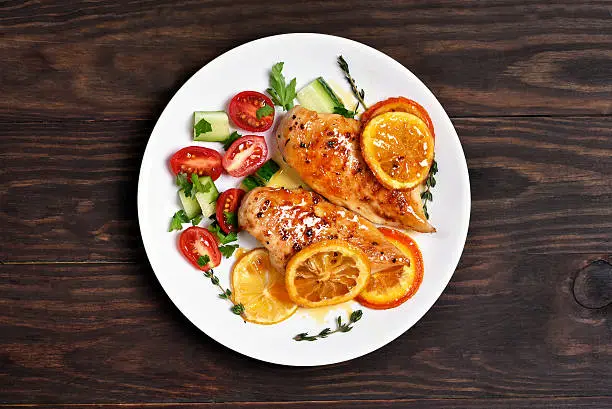 Photo of Baked chicken breast, top view