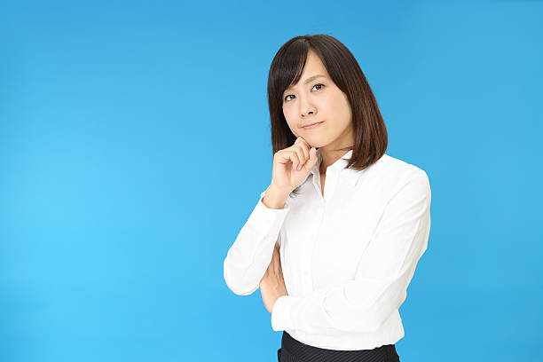istock Uneasy Asian business woman 628764554