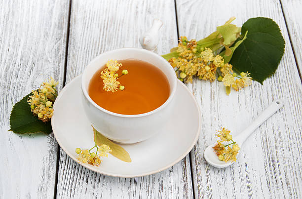 istock cup of herbal tea with linden flowers 628764596