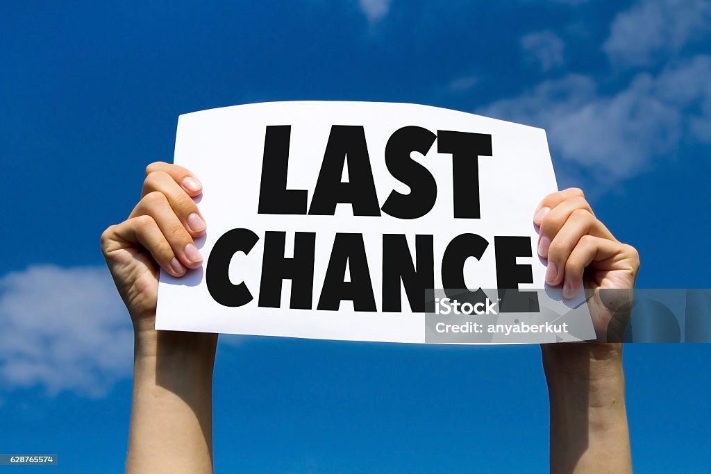 last chance last chance, concept, hands holding paper sign Last Chance - Short Phrase Stock Photo