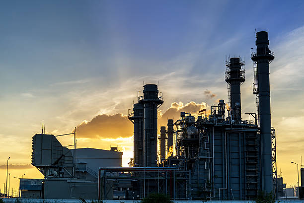 istock Oil refinery plant at sunrise with sky background 628766106