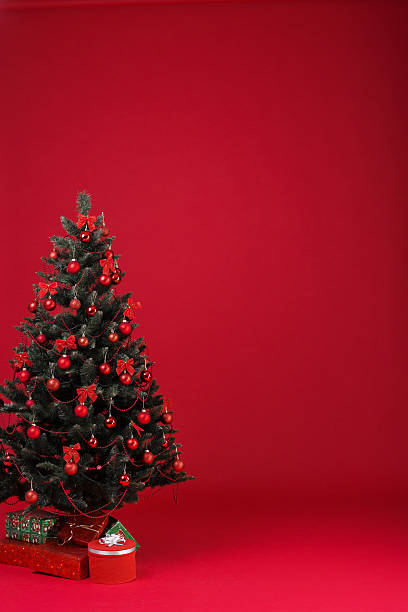 istock Christmas tree decorated with red balls 628789674