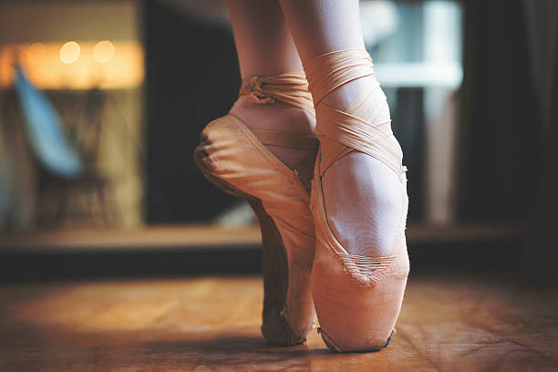 istock Close up shot of balerina legs 628789732