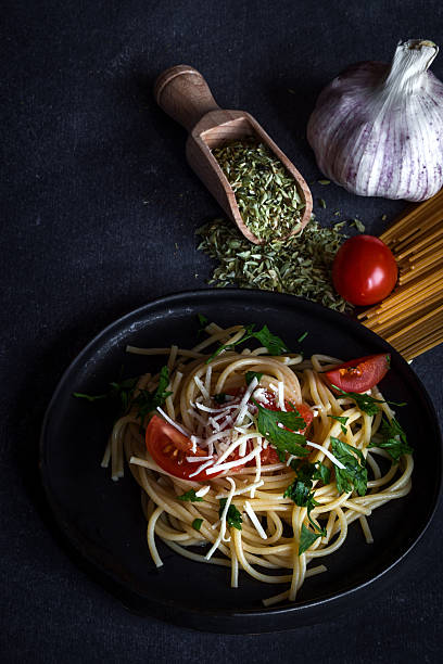 istock Spaguetti with tomato cheese and oregano 628791952