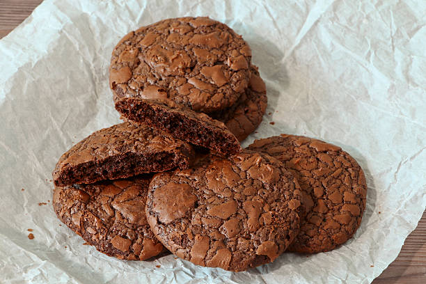 istock Fudge brownie cookies heap on parchment 628792380