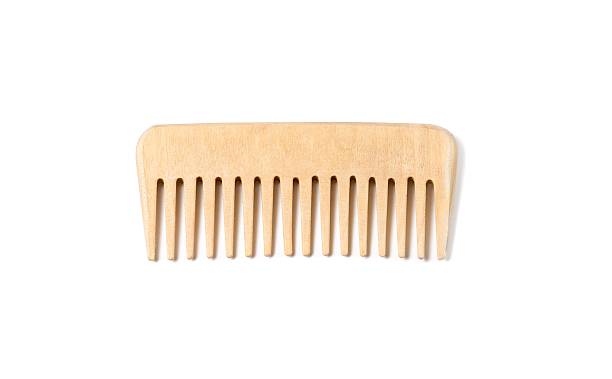 Wooden hairbrush isolated stock photo