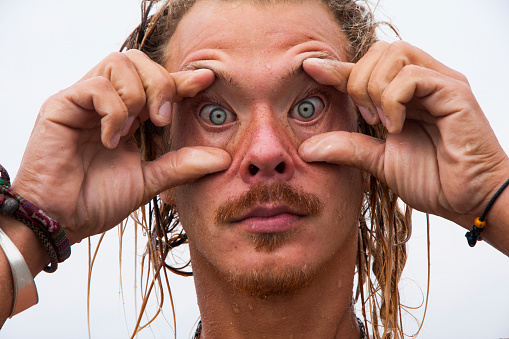 Young Big Blue Eyed Man Making A Funny Face Stock Photo - Download Image Now - Adult, Blond Hair, Boys - iStock Young Big Blue Eyed Man Making A Funny Face Stock Photo - Download Image Now - Adult, Blond Hair, Boys - iStock