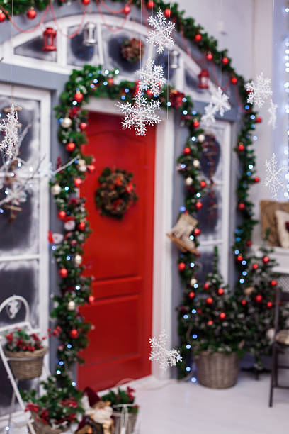 istock decorative snowflakes in the background at hose with red door 628800930