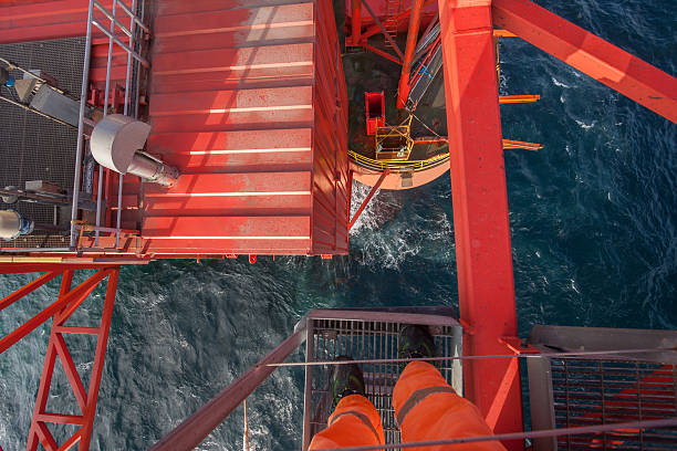 istock standing on oil rig platform over the sea 628801484