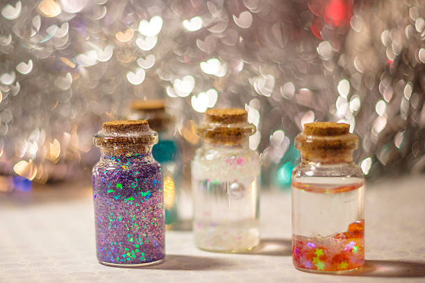 istock colorful decorative bottles with sparkles 628801548