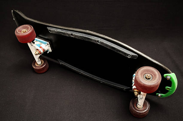 istock Old Used Wooden Skateboard 628802216