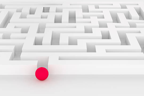 istock 3d rendering of  white labyrinth with red ball 628803462