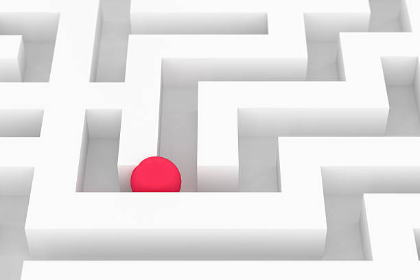 istock 3d rendering of  white labyrinth with red ball 628803512