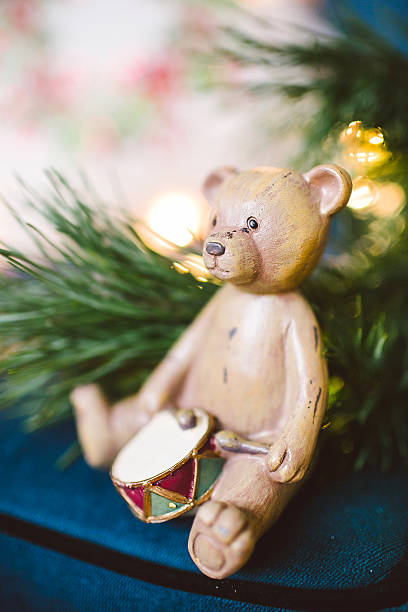 istock Old wooden bear toy in Christmas decorations 628811374