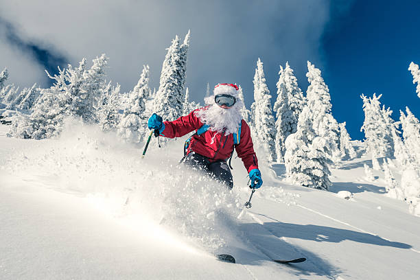 Santa goes skiing stock photo