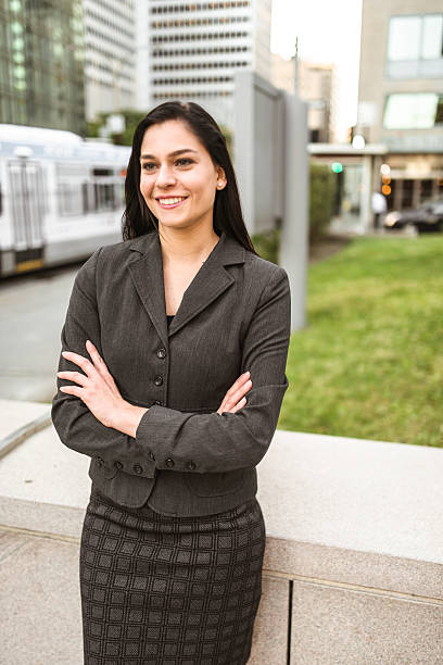 istock business woman with arm crossed on urban scene 628811684