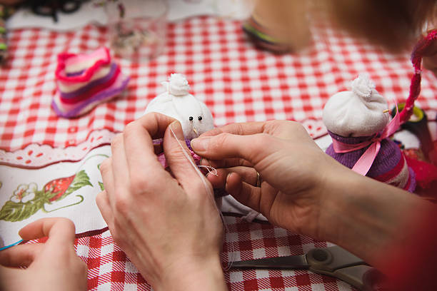 istock Woman doing Christmas crafts 628812186