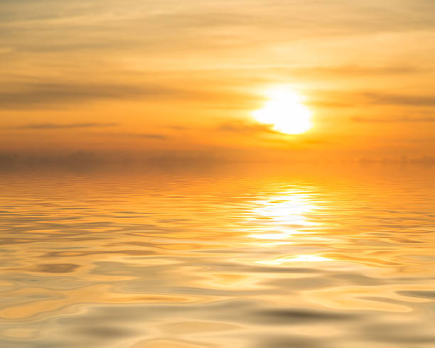 istock Sunset over calm ocean or sea 628812606