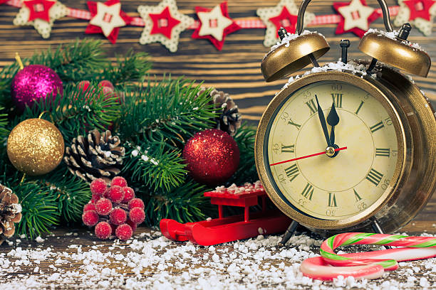 istock Christmas clock and fir branches 628813422