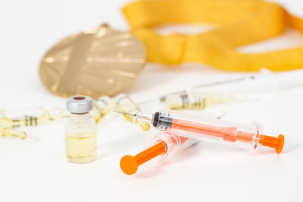 doping steroid sport drugs health closeup win syringe doping steroid sport drugs health closeup win syringe abuse many athletics liquid concept - stock image erythropoietin stock pictures, royalty-free photos & images
