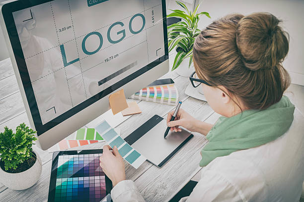 Graphic designer at work. Color samples. logo design brand designer sketch graphic drawing creative creativity draw studying work tablet concept - stock image graphic designer photos stock pictures, royalty-free photos & images