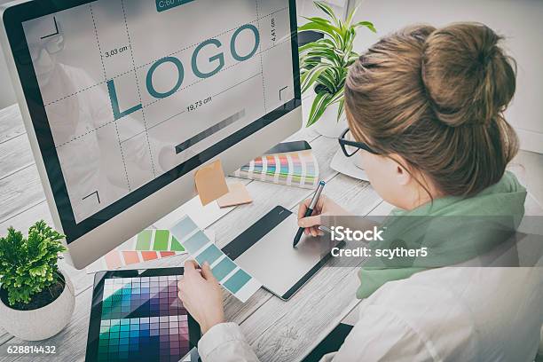 Graphic Designer At Work Color Samples Stock Photo - Download Image Now - Graphic Designer, Design Professional, Computer Graphic