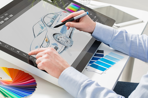 designer graphic drawing car creative creativity draw work tablet screen sketch designing coloring concept - stock image
