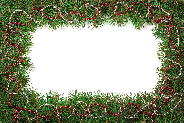 istock Christmas frame made of fir branches decorated with beads isolated 628815834