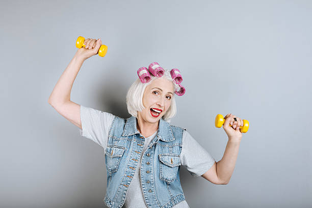 istock Attractive senior woman doing exercises and smiling. 628816166