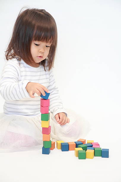 istock Japanese girl playing with blocks (2 years old) 628816502