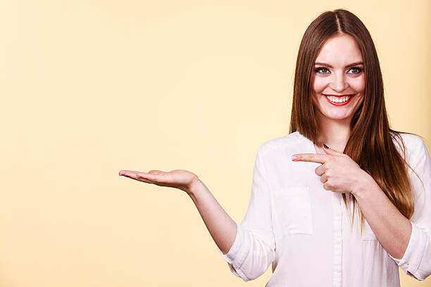 istock Woman holds empty hand copy space for product 628817068