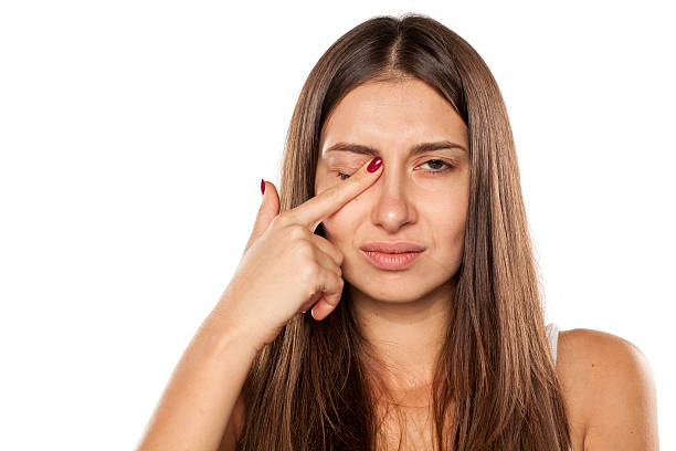 istock young women have itching in the eye 628818454