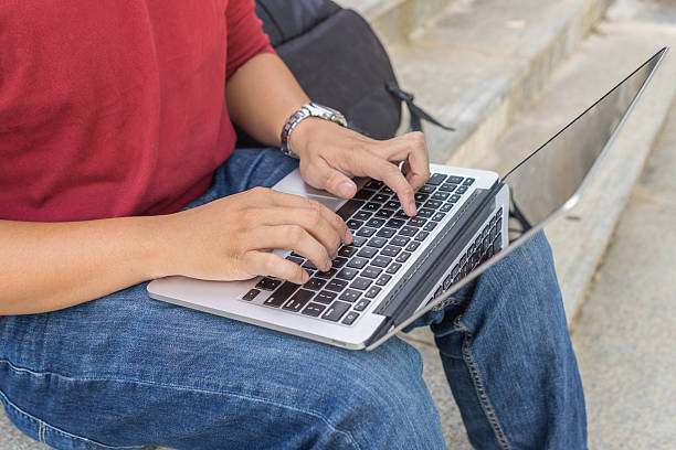 istock Close-up of human hands typing on laptop keyboard 628819930