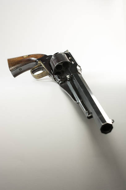 istock Cap and Ball  Revolver on white with shadow- copy space 628820556