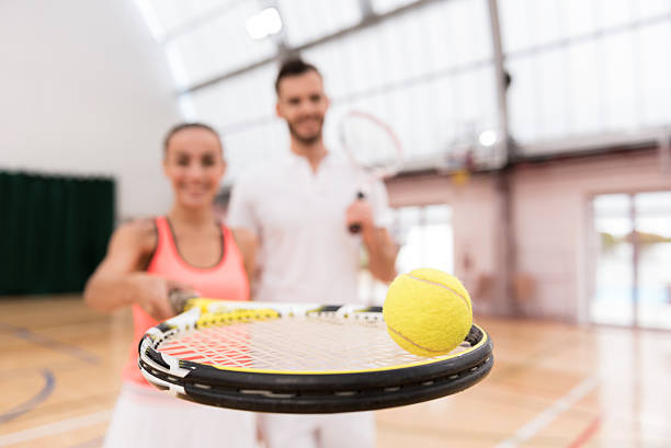 istock Selective focus of tennis ball lying on the racket 628820868