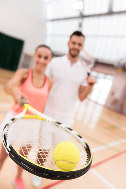 istock Selective focus of tennis ball lying on the racket 628820898
