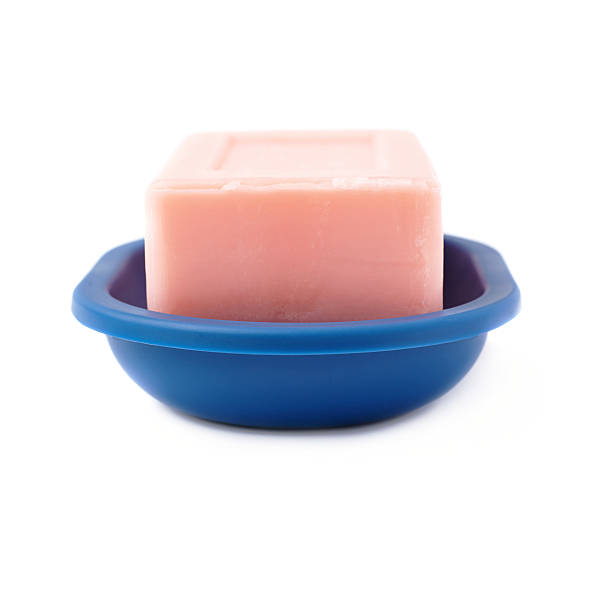 istock Pink soap bar isolated over white background 628822566