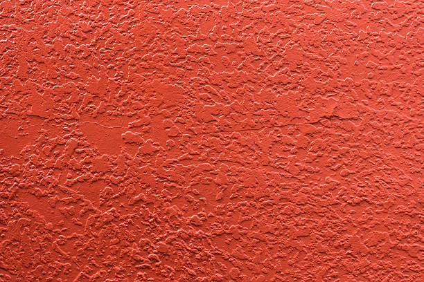 istock Texture of orange concrete wall 628823654