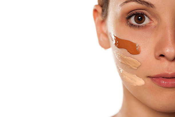 istock young beautiful woman with three different foundation on her face 628835412