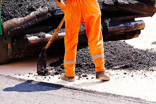 istock asphalting of the road 628836754