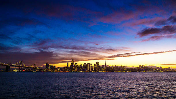 istock San Francisco City Lights with Dramatic Clouds at Sunset 628846106