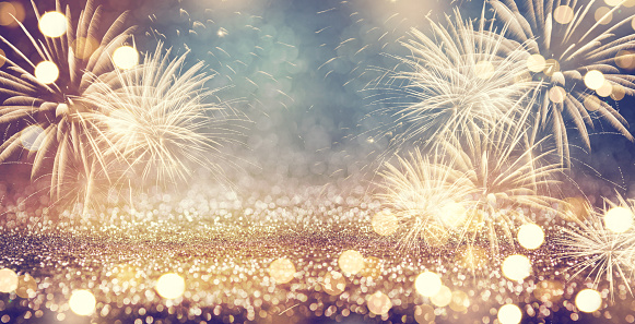 Defocused vintage fireworks and bokeh at New Year and copy space. Abstract background holiday.