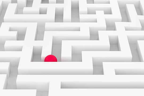 istock 3d rendering of  white labyrinth with red ball 628848438