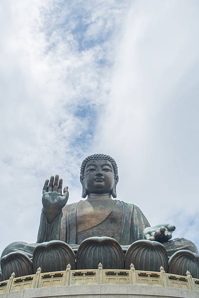 istock Tian Tan Buddha and bright blue sky 628856698