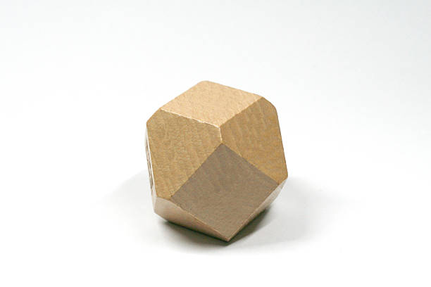 istock Wooden Polyhedron on white background 628857144