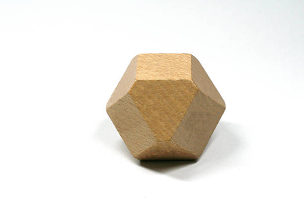 istock Wooden Polyhedron on white background 628857156