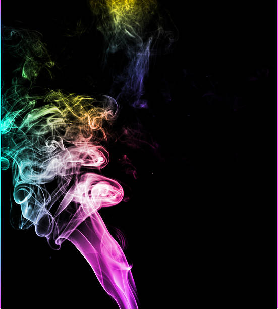istock Colorful smoke in dark background 628857266
