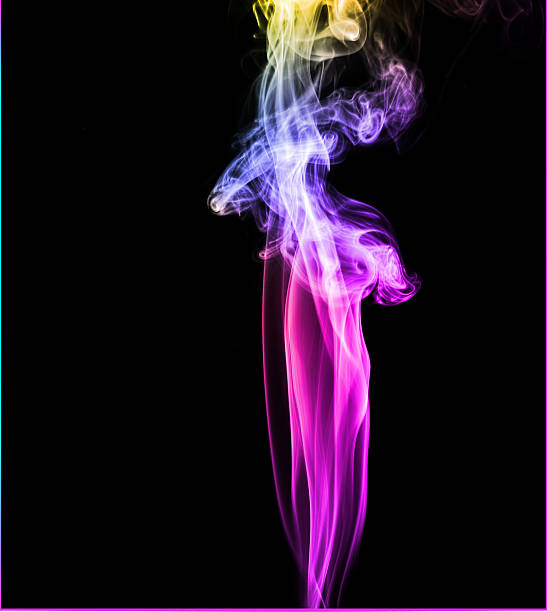 istock Colorful smoke in dark background 628873662